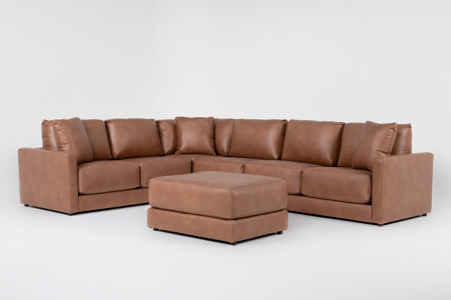 alicia saddle brown vegan faux leather 140" 4 piece sectional & ottoman 1 alicia saddle brown vegan faux leather 140" 4 piece sectional & ottoman
