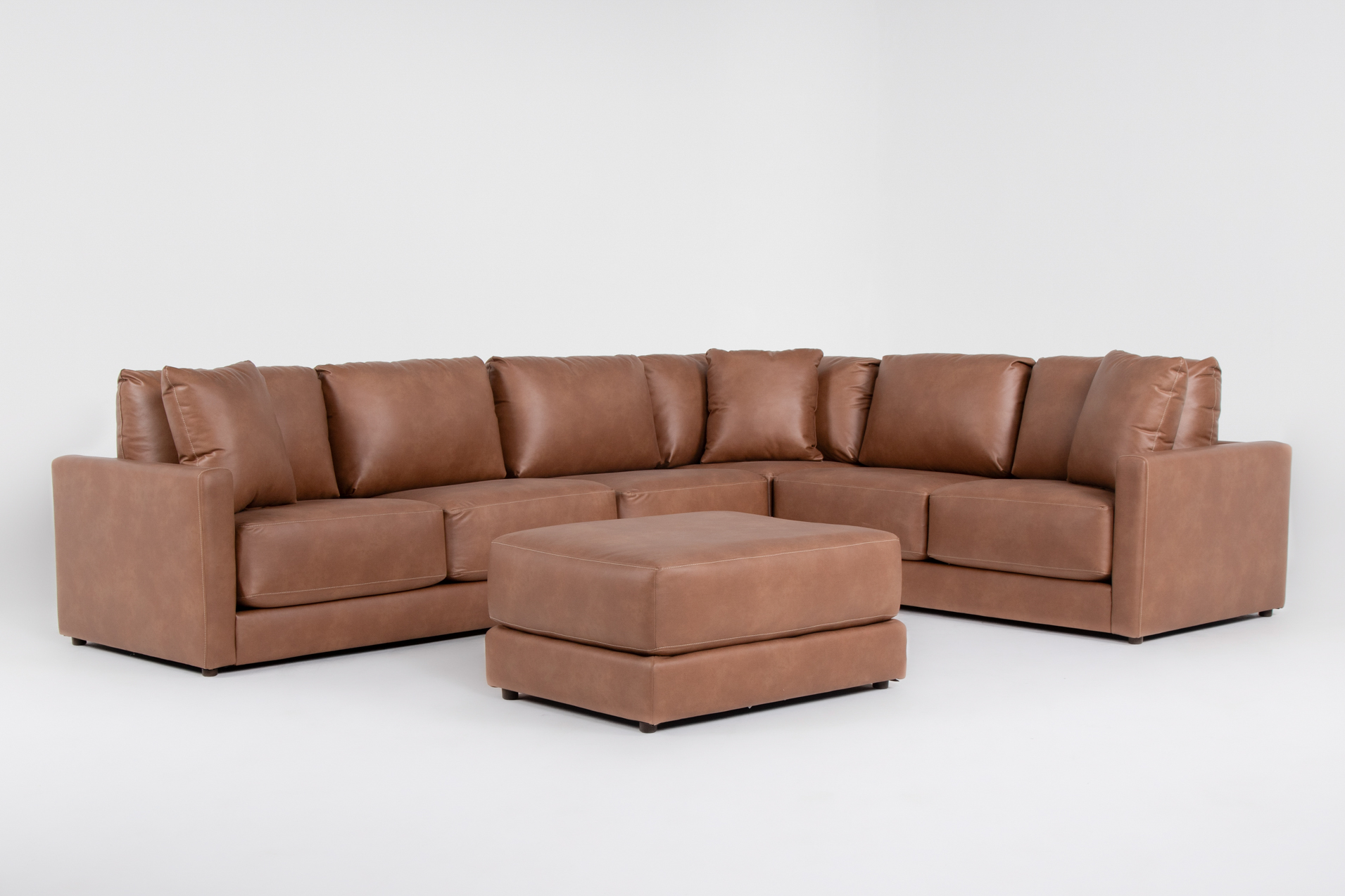 alicia saddle brown vegan faux leather 140" 4 piece sectional & ottoman 12 alicia saddle brown vegan faux leather 140" 4 piece sectional & ottoman