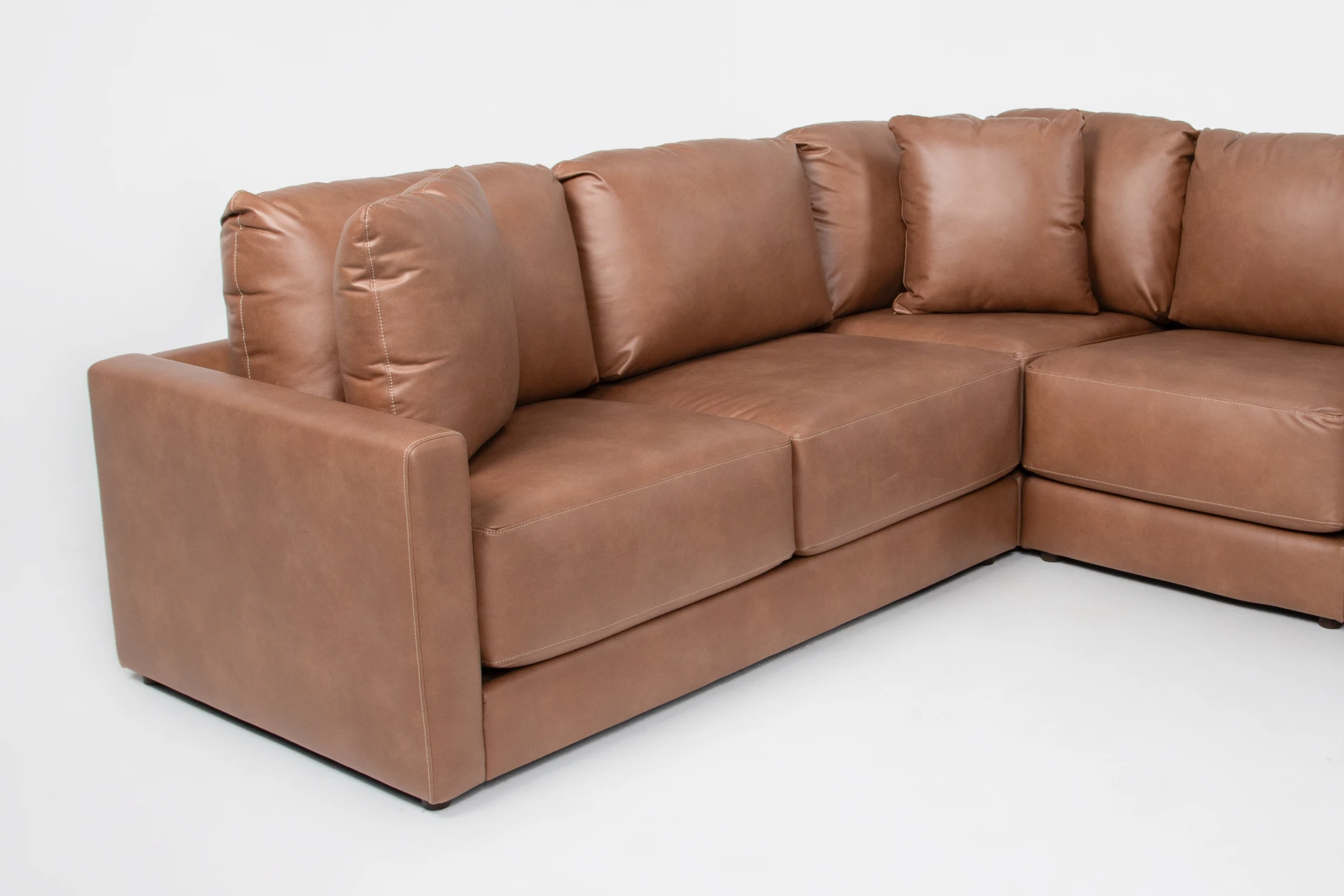 alicia saddle brown vegan faux leather 140" 4 piece sectional & ottoman 13 alicia saddle brown vegan faux leather 140" 4 piece sectional & ottoman