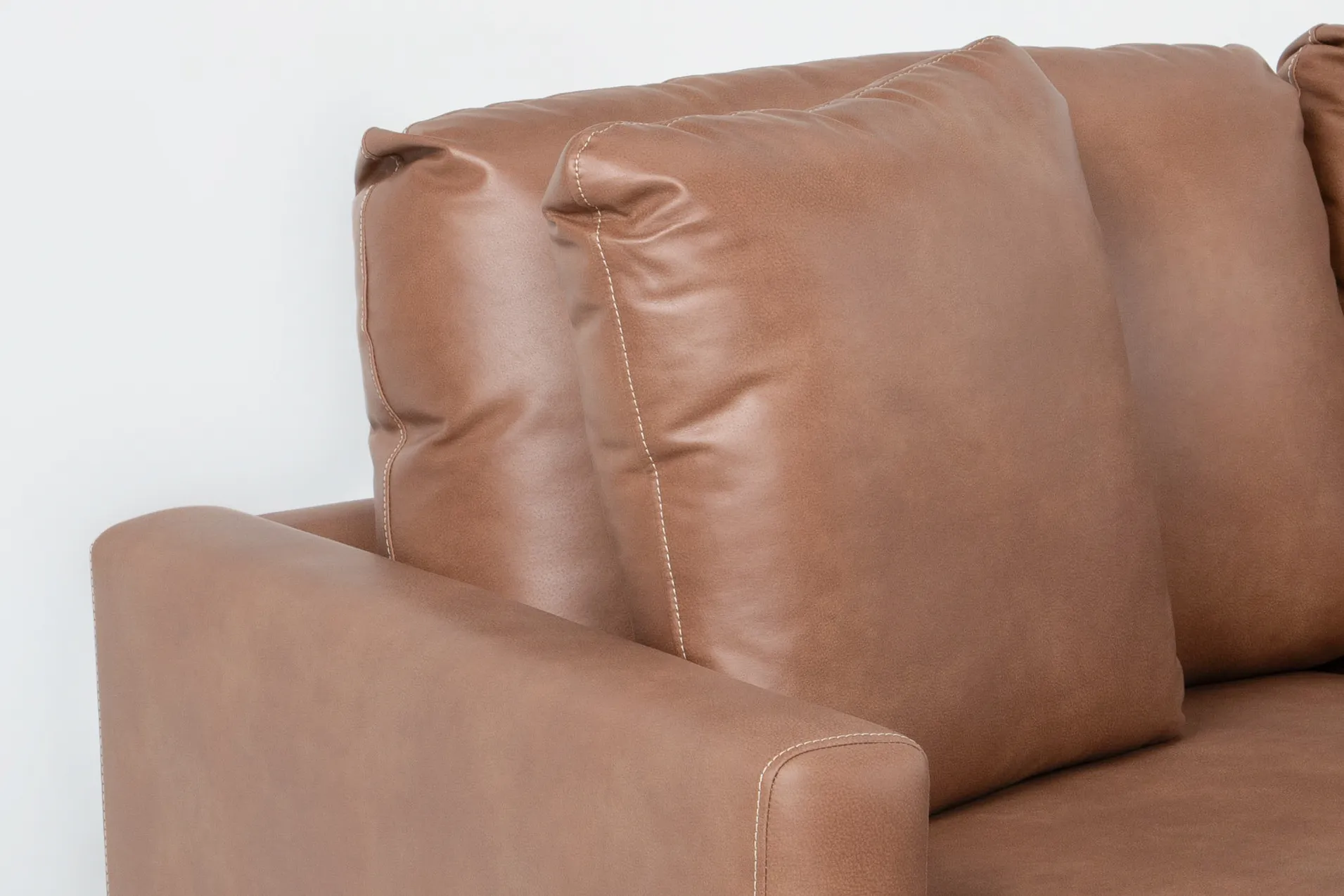 alicia saddle brown vegan faux leather 140" 4 piece sectional & ottoman 15 alicia saddle brown vegan faux leather 140" 4 piece sectional & ottoman