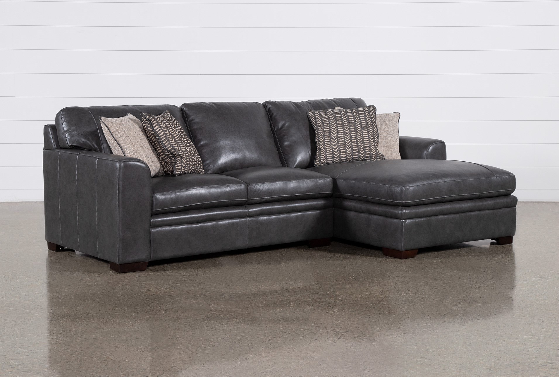 greer dark grey black leather 2 piece 105" modular sectional with right arm facing chaise & left arm facing loveseat | deep seated 1 greer dark grey black leather 2 piece 105" modular sectional with right arm facing chaise & left arm facing loveseat | deep seated
