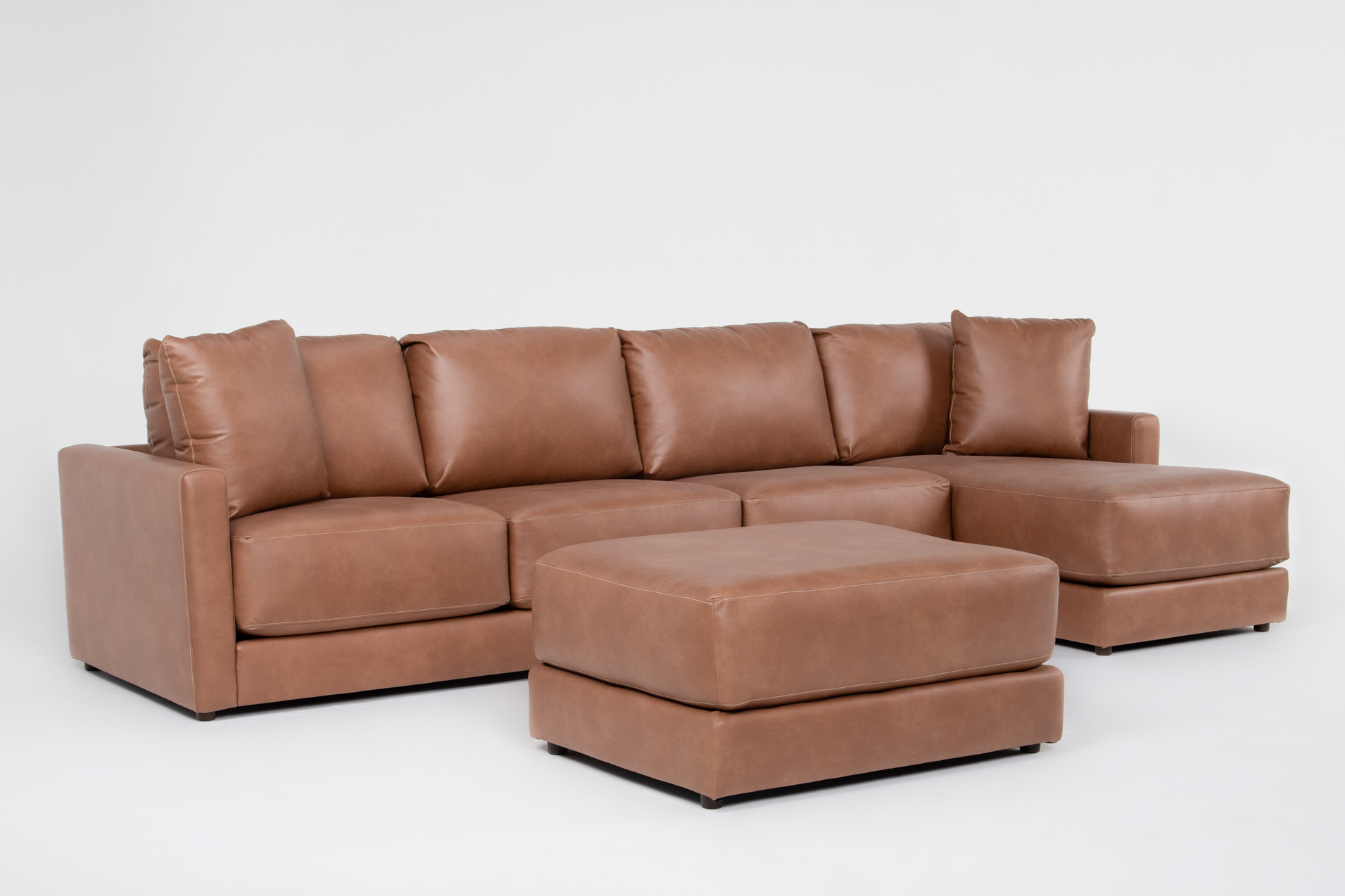 alicia saddle brown vegan faux leather 138" 3 piece sectional with right arm facing chaise & ottoman 1 alicia saddle brown vegan faux leather 138" 3 piece sectional with right arm facing chaise & ottoman