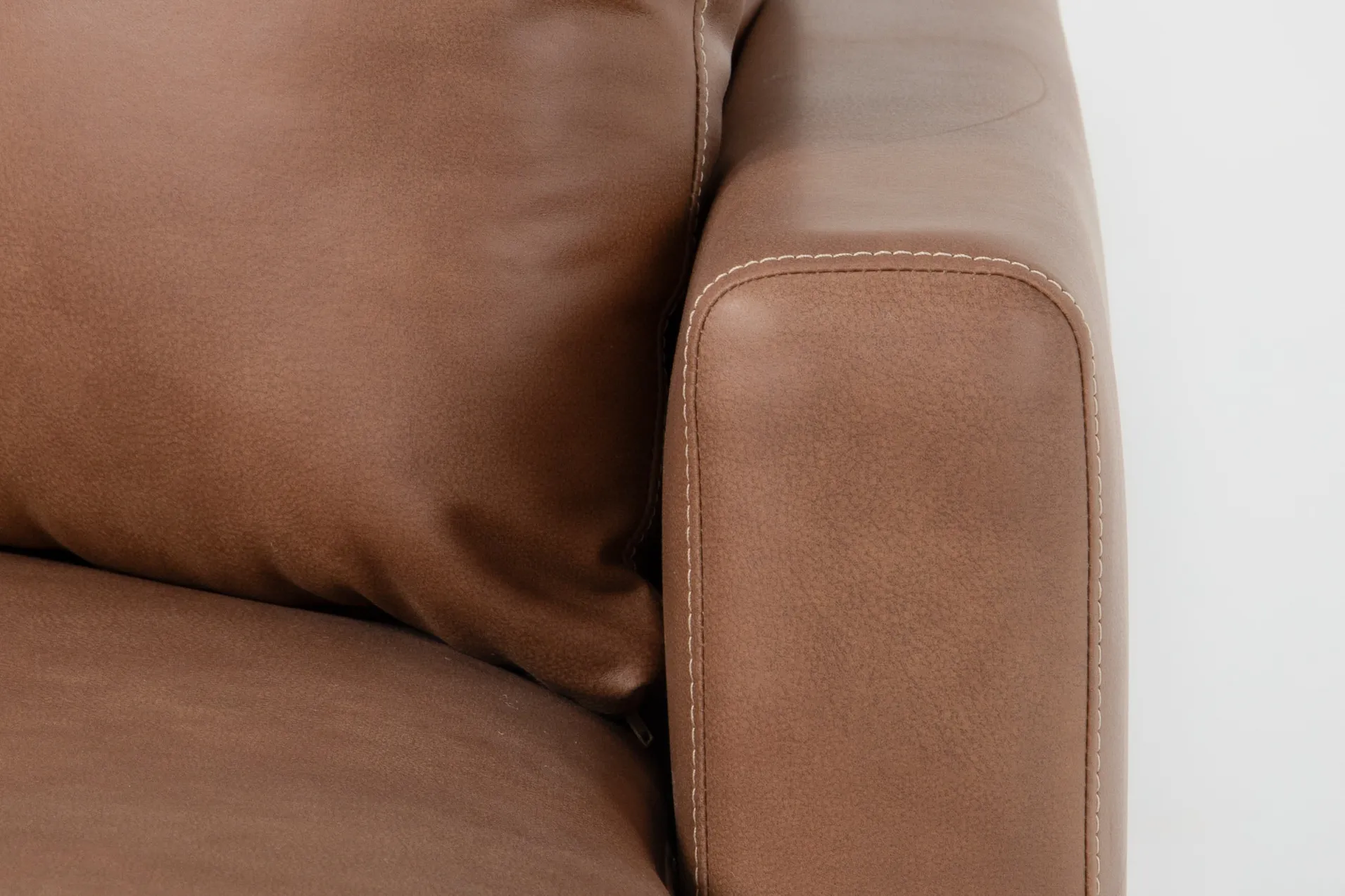 alicia saddle brown vegan faux leather 138" 3 piece sectional with right arm facing chaise & ottoman 9 alicia saddle brown vegan faux leather 138" 3 piece sectional with right arm facing chaise & ottoman