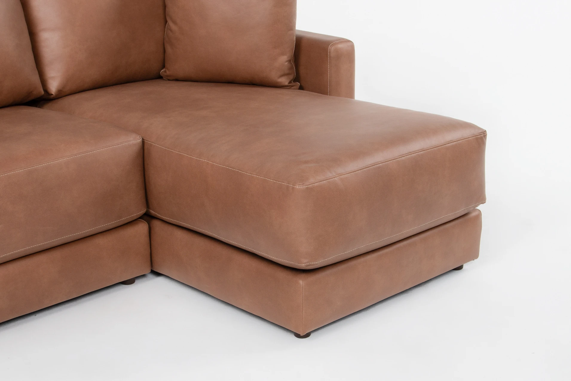 alicia saddle brown vegan faux leather 138" 3 piece sectional with right arm facing chaise & ottoman 11 alicia saddle brown vegan faux leather 138" 3 piece sectional with right arm facing chaise & ottoman